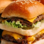 Delicious cheeseburger sliders served on a platter, perfect for parties.