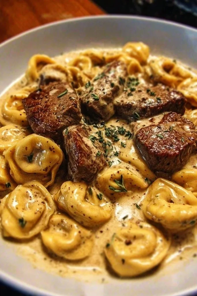 Delicious Garlic Steak Tortellini served in creamy sauce