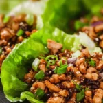 Healthy Chicken Lettuce Wraps recipe with fresh ingredients and flavorful filling.