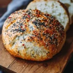 Loaf of Everything Bagel No-Knead Bread with toppings