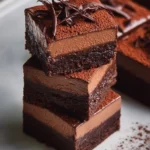 Delicious chocolate mousse brownies topped with creamy mousse layer.
