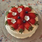 Delicious homemade strawberry cake with fresh strawberries and whipped cream